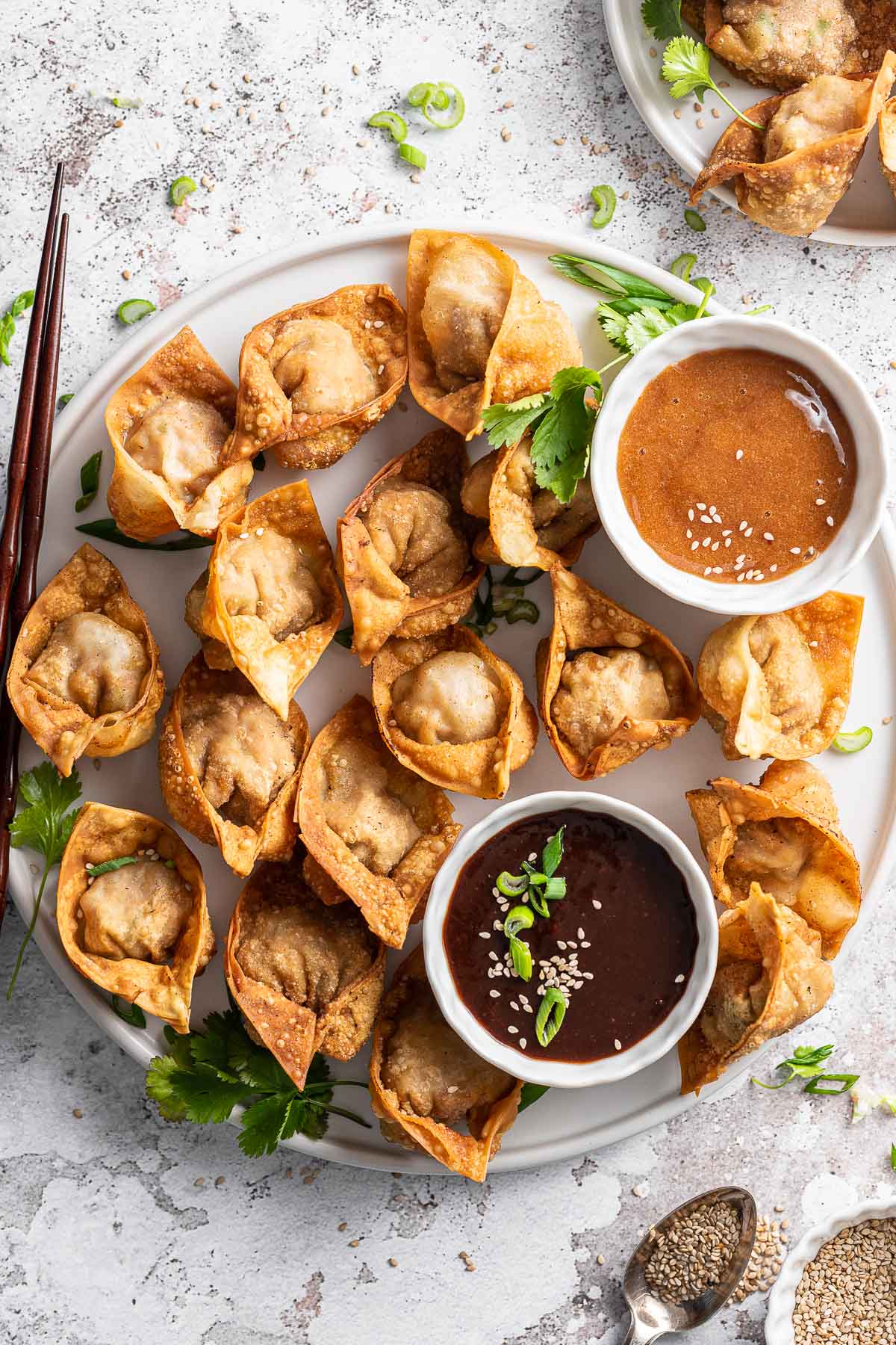 Duck Sauce finished sauce in bowl plated with wontons