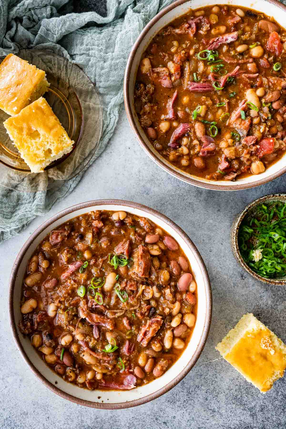 15 Bean Soup cooked soup in bowl and cornbread pieces on side