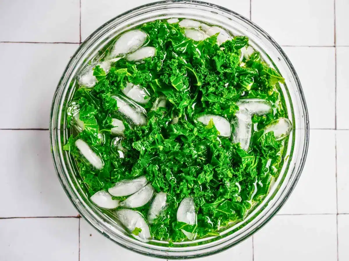 Leafy greens in ice water