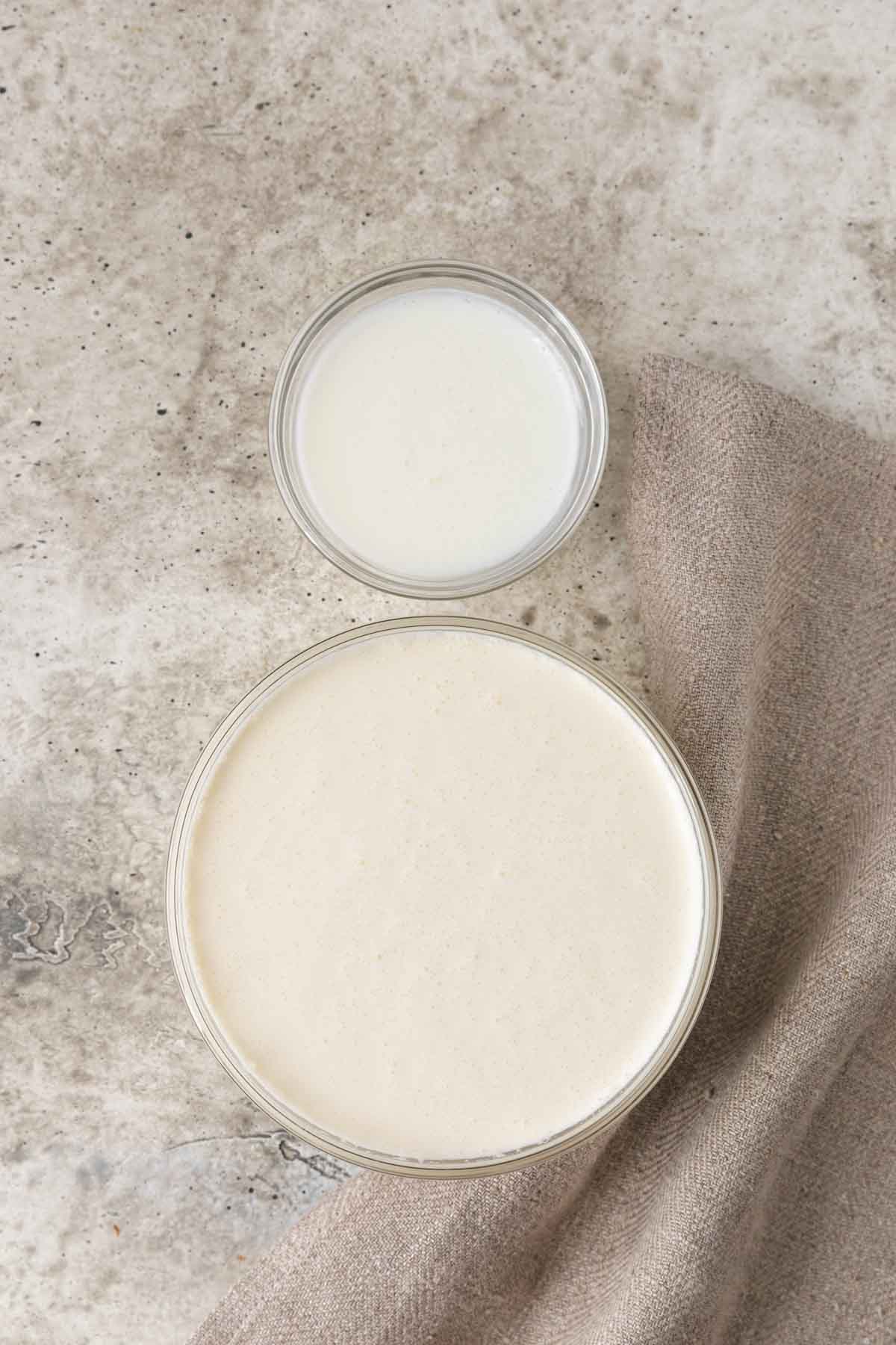 Creme Fraiche cream and buttermilk in separate bowls