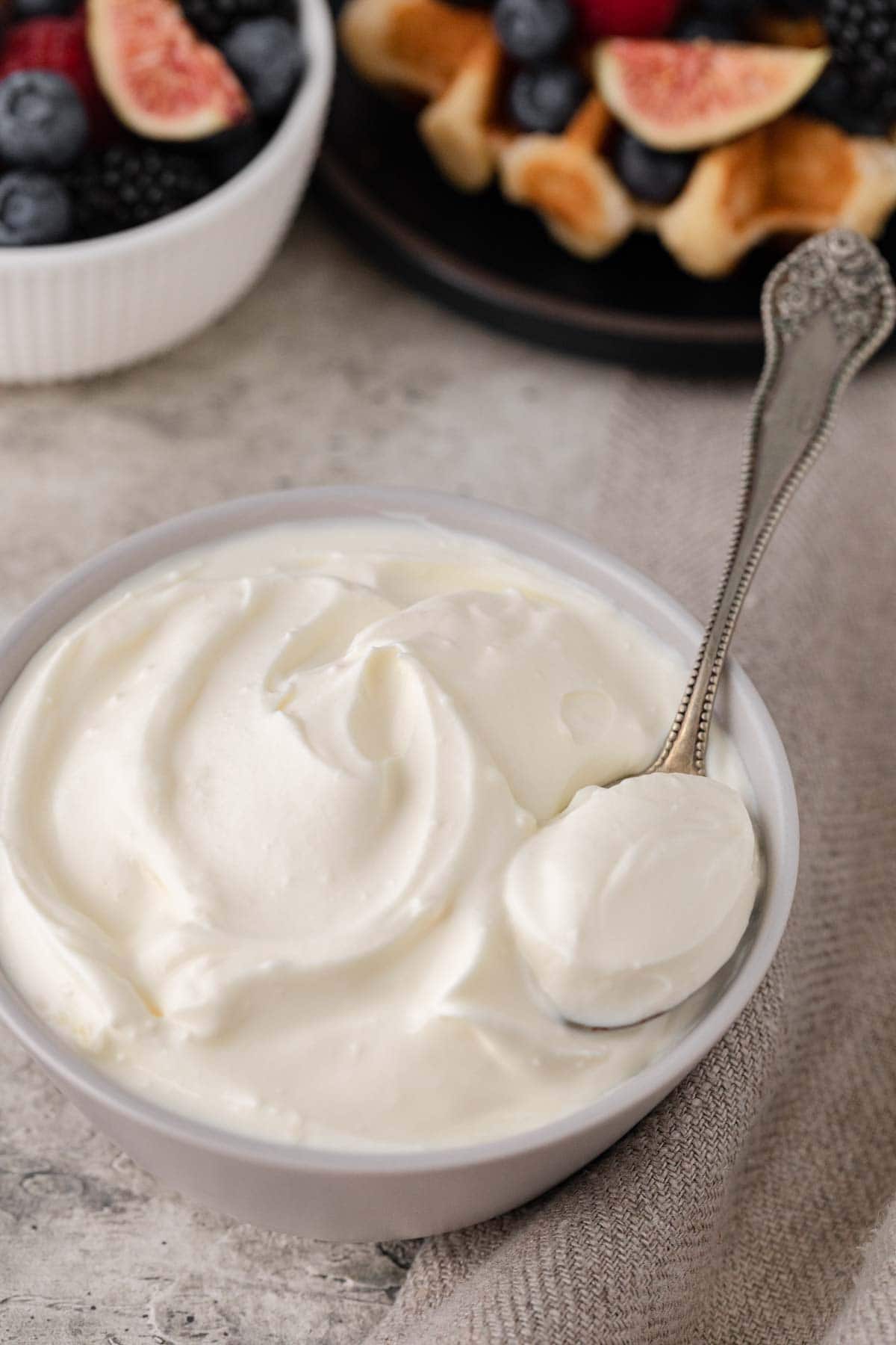 Creme Fraiche finished creme fraiche in bowl with spoon