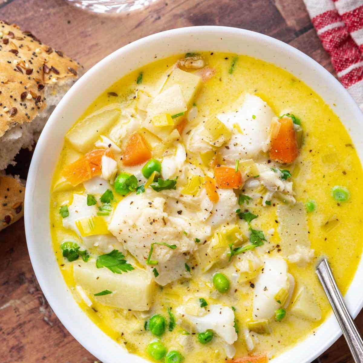 Fish Soup finished soup in bowl with spoon