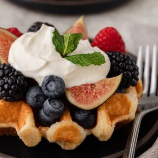 Creme Fraiche finished creme on waffle with fruit and berries