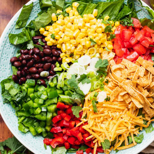 all salad ingredients in bowl before tossing 4x3 image