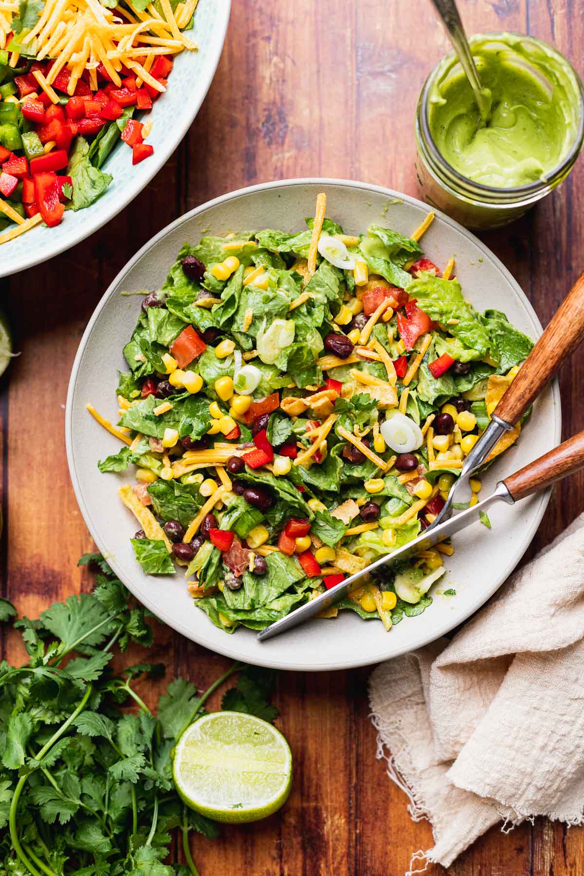 Southwest Salad tossed and dressed salad in bowl with utensils