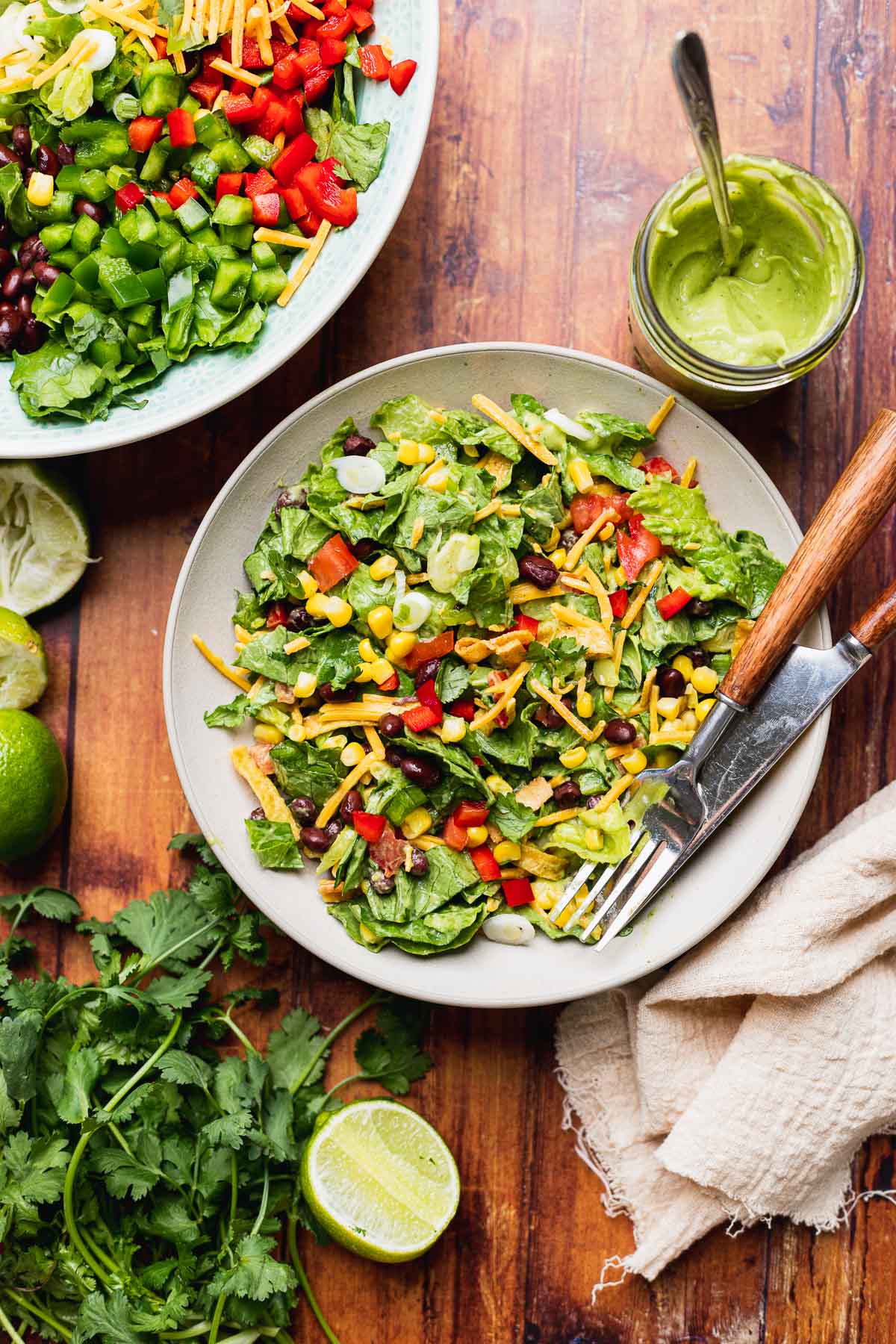 Southwest Salad tossed and dressed salad in bowl with utensils