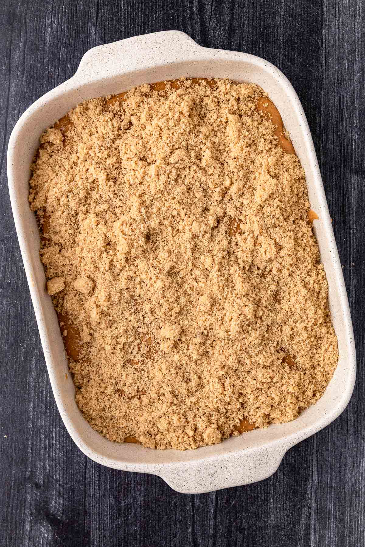 adding brown sugar topping