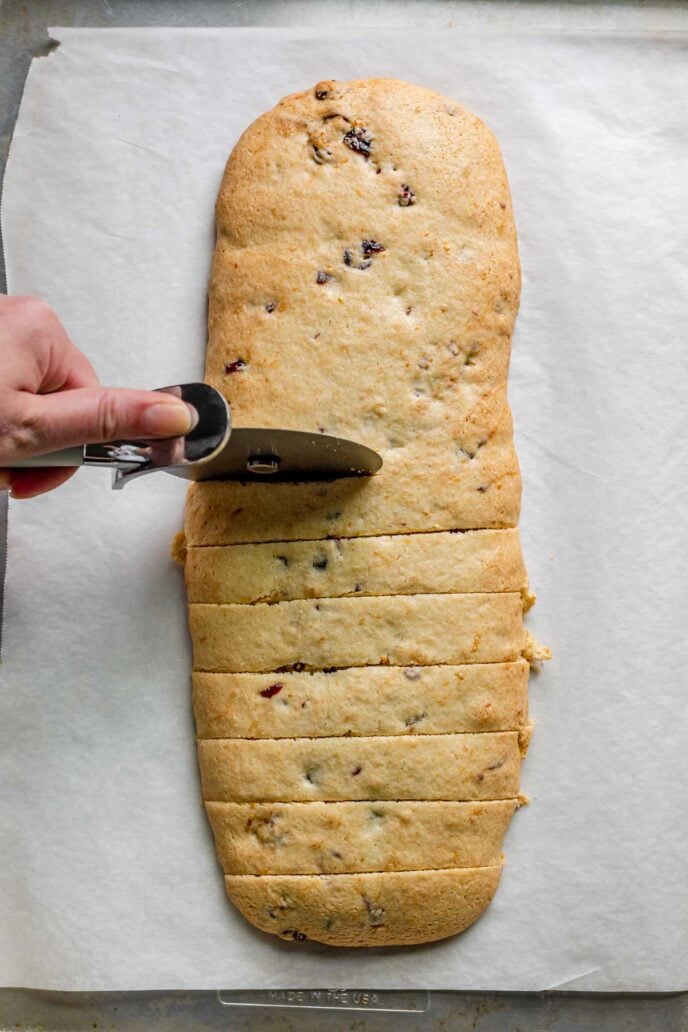 Cranberry Orange Biscotti Cookies being sliced