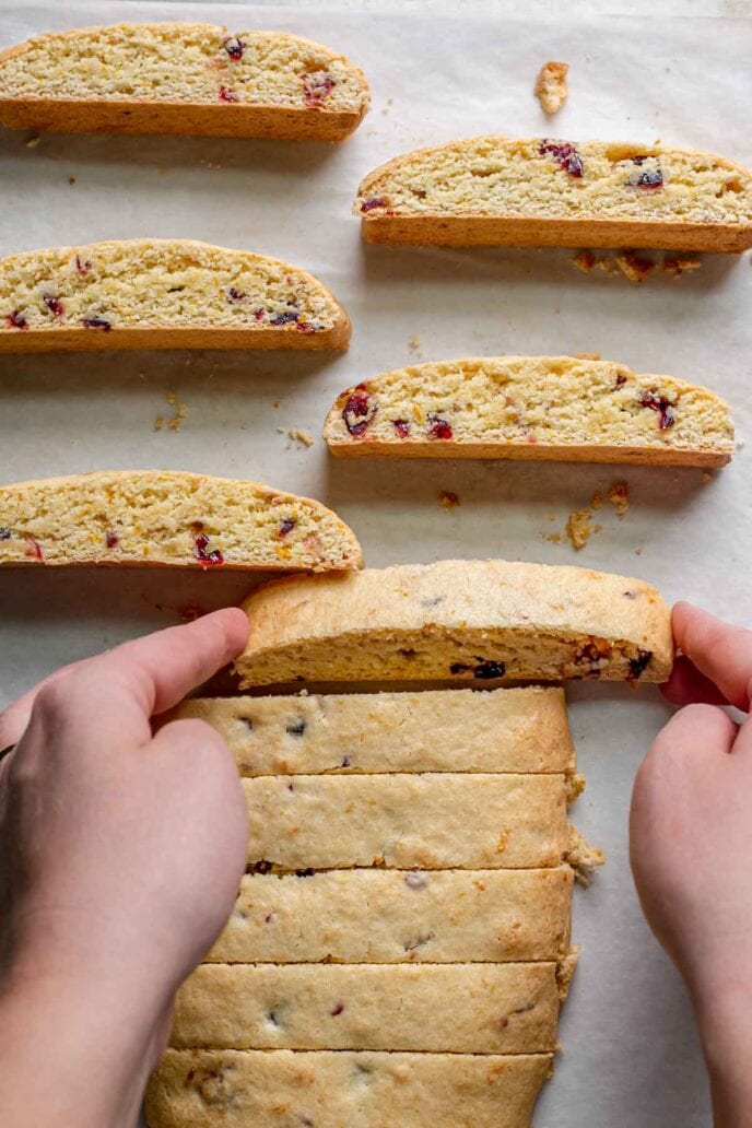 Cranberry Orange Biscotti Cookie slices on pan