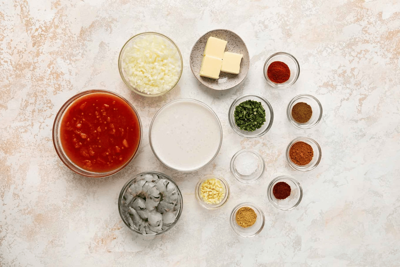 Shrimp curry ingredients in glass dishes