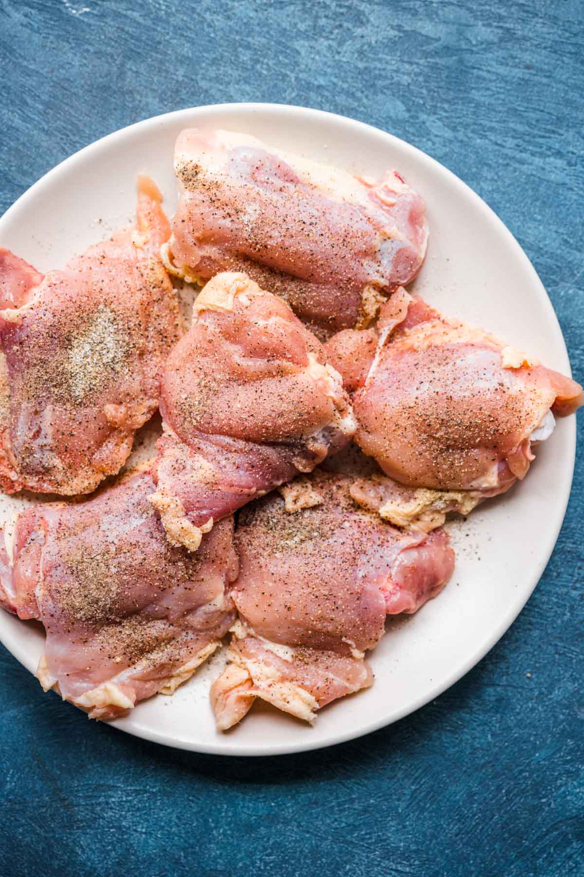 seasoned chicken thighs before cooking