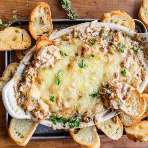 Dip in a casserole dish with slices of toasted bread