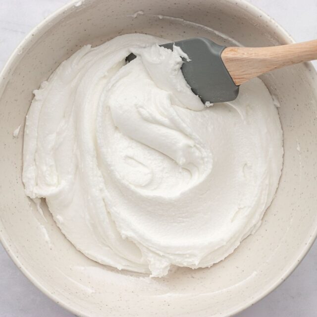 Royal Icing with spatula to stir and scrape bowl