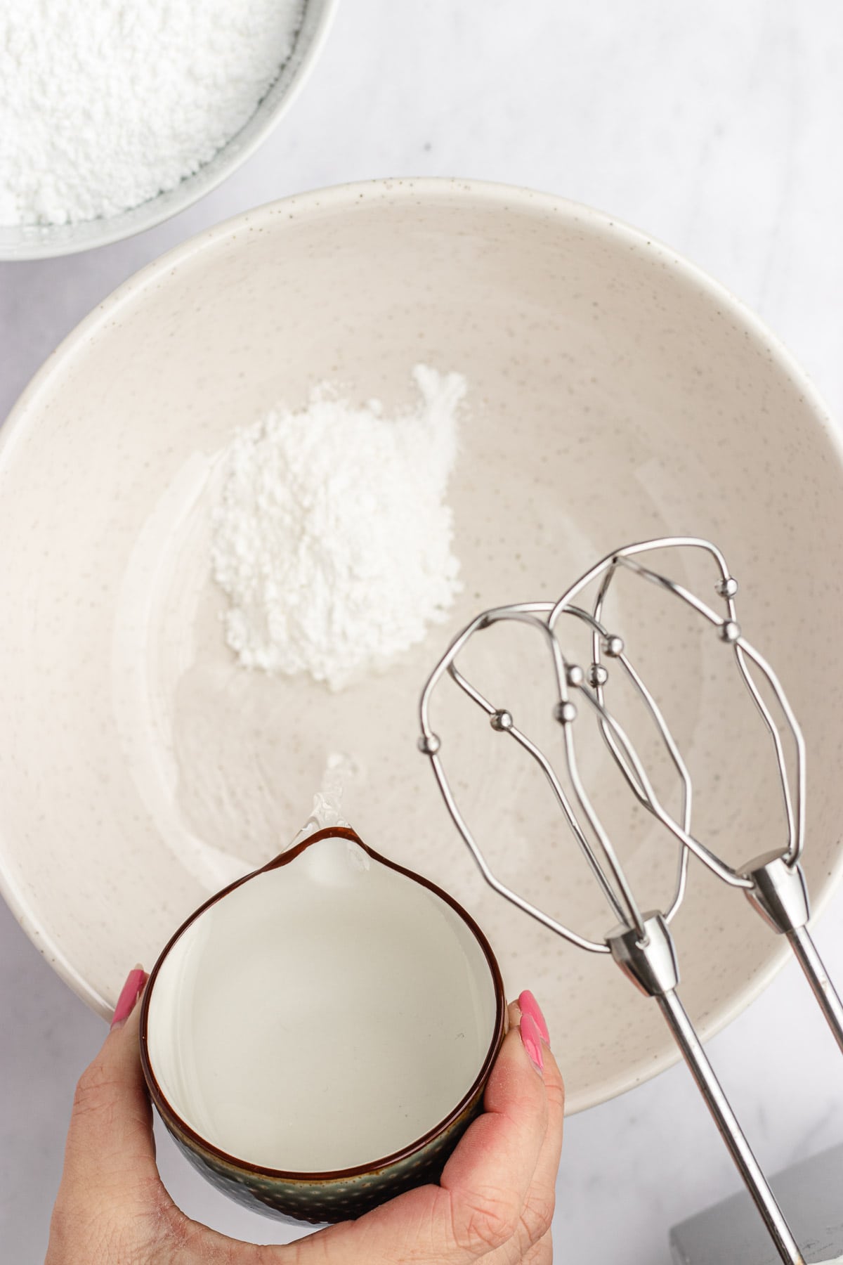 Royal Icing meringue powder in mixing bowl