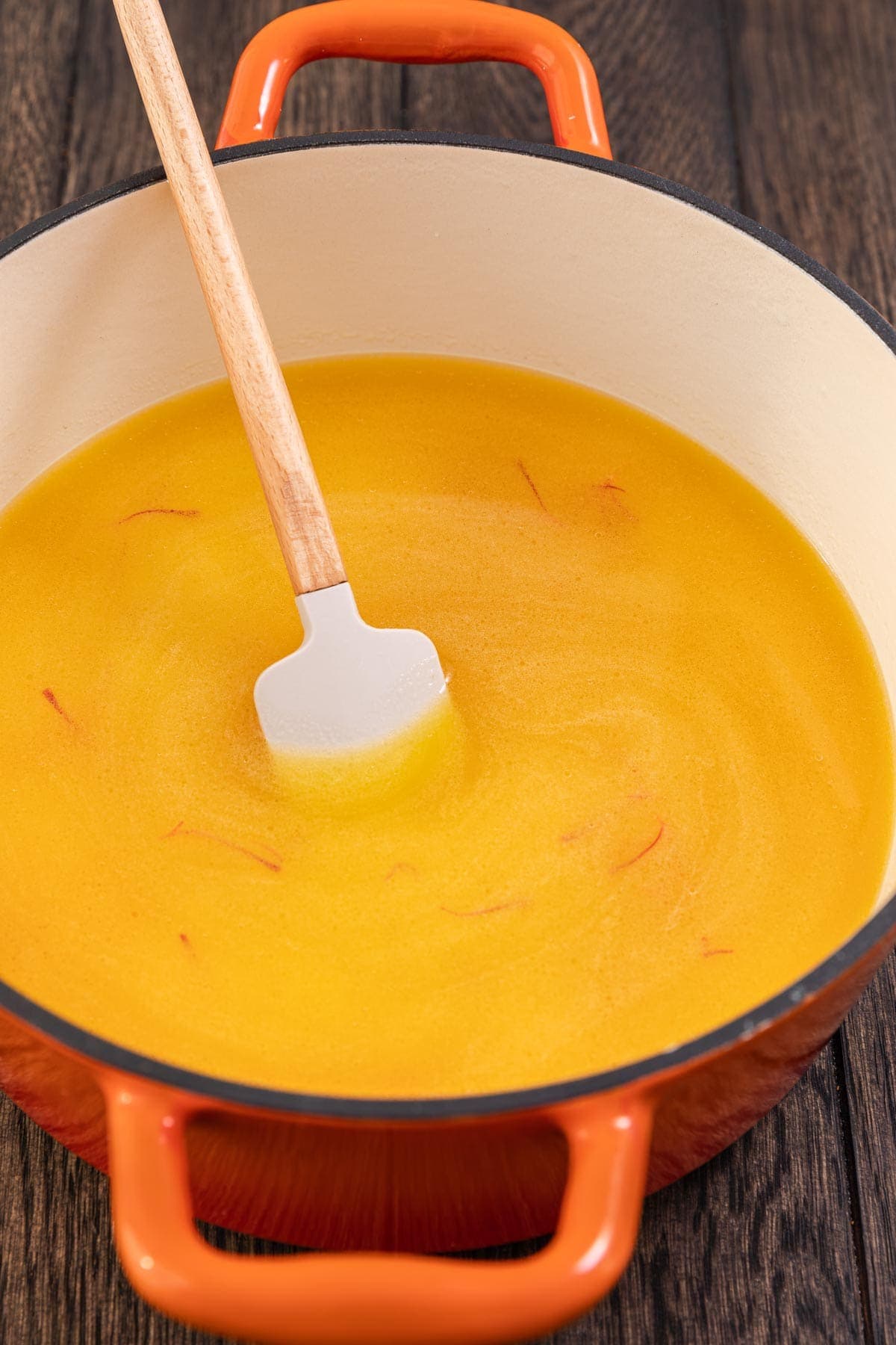 broth and saffron in a pot 