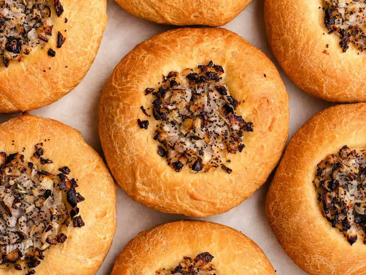 Savory rolls on parchment paper.