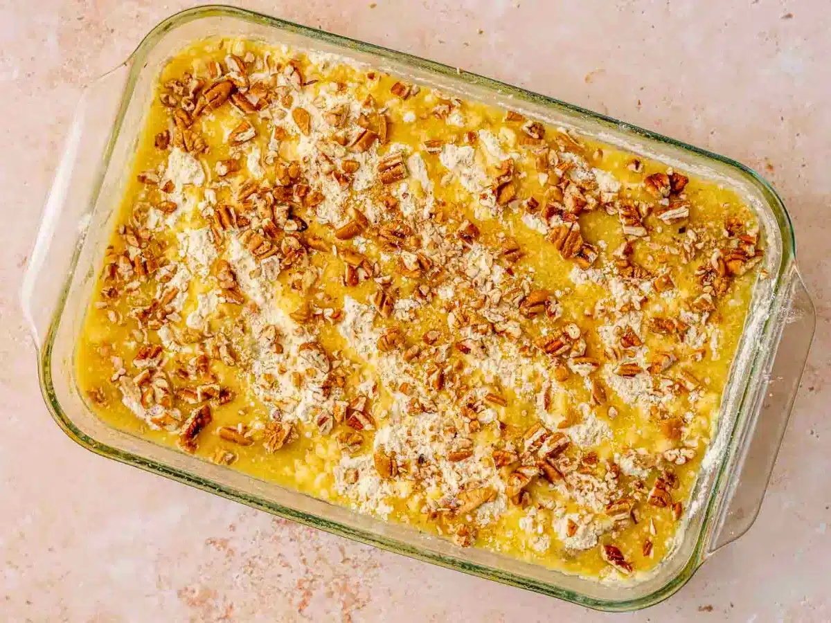 Cake in pan with pecans