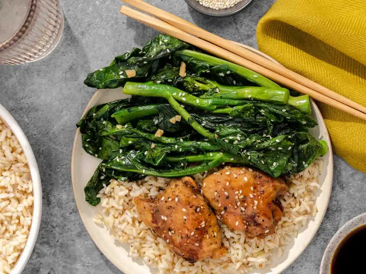chicken rice and broccoli on plate 