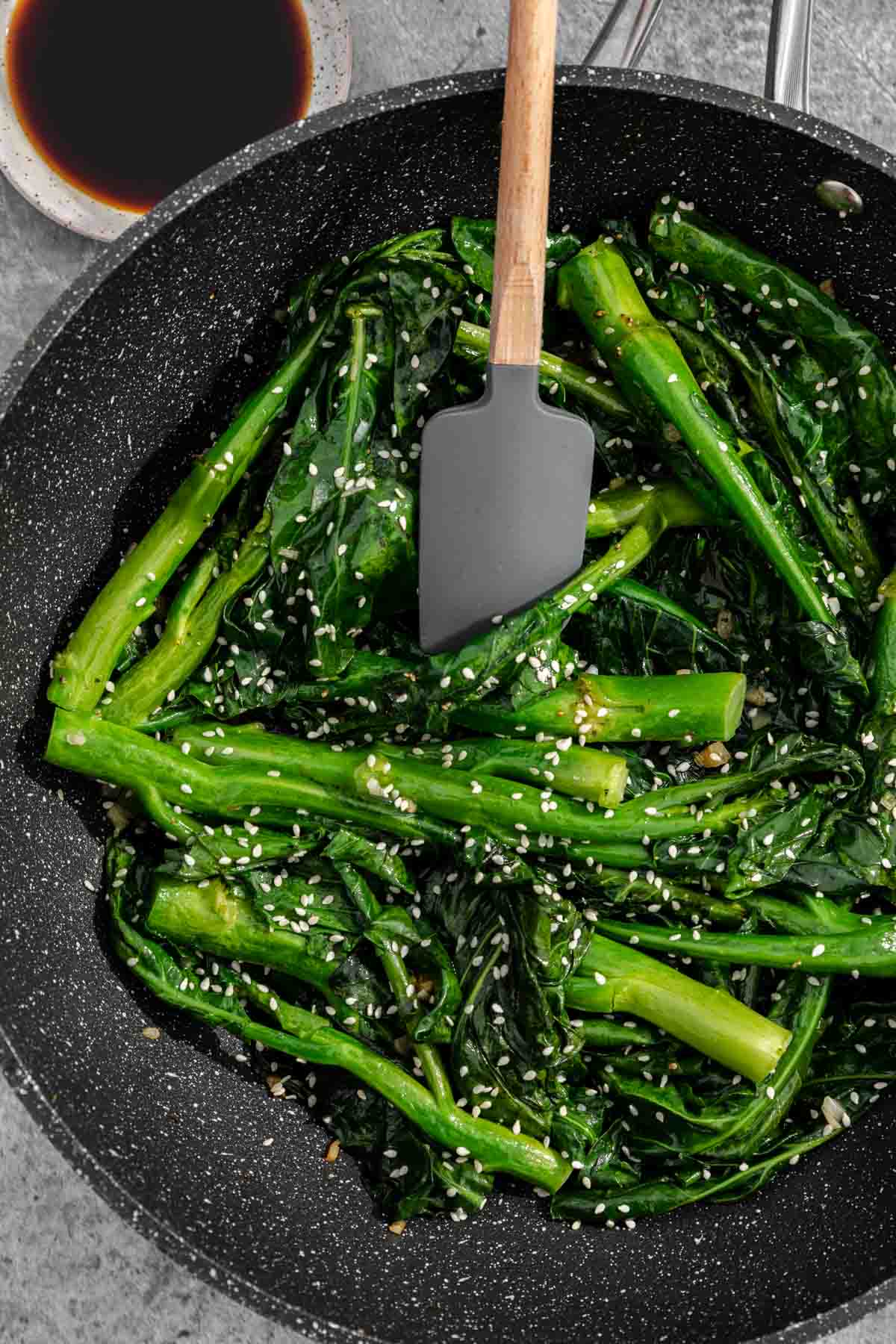 stirring broccoli