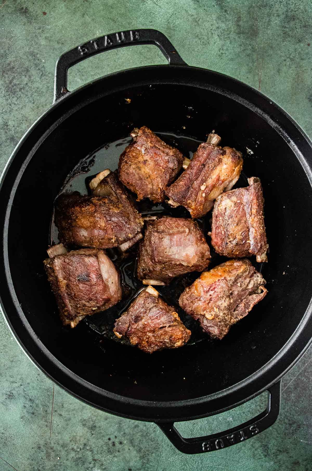 Guinness Braised Short Ribs browned meat in pot