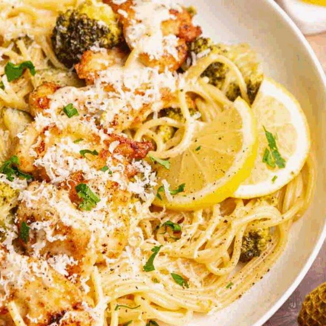 cooked poultry on top of zesty pasta