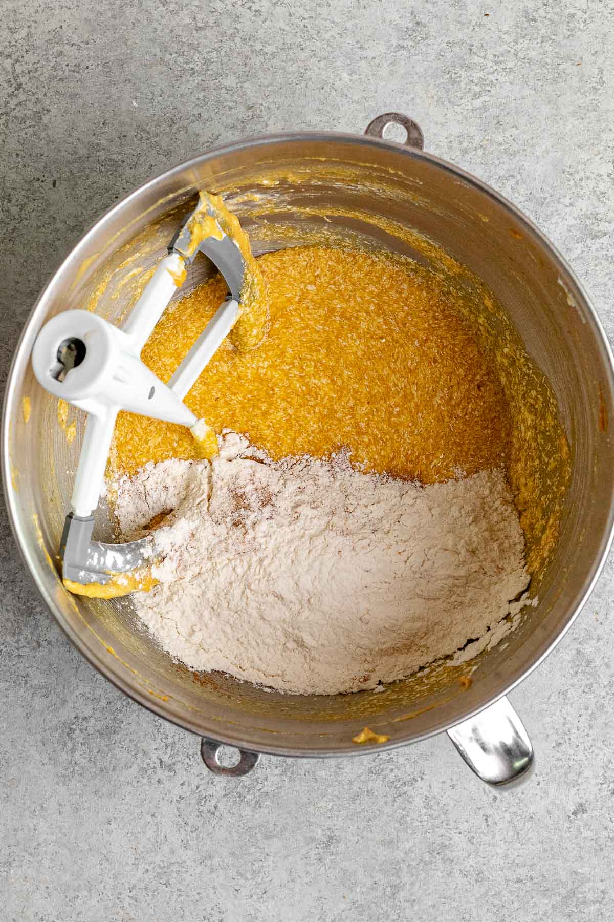 mixing flour into batter 