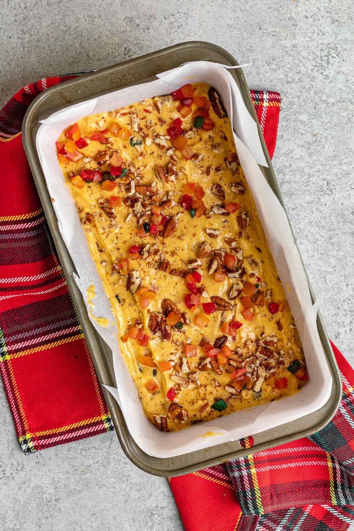 unbaked fruit cake in loaf pan 