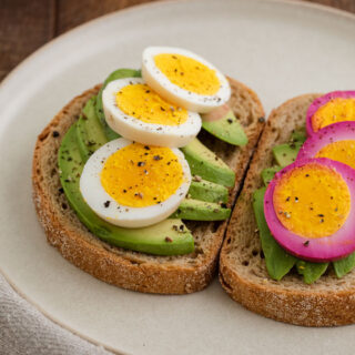Hard boiled eggs on avocado toast.