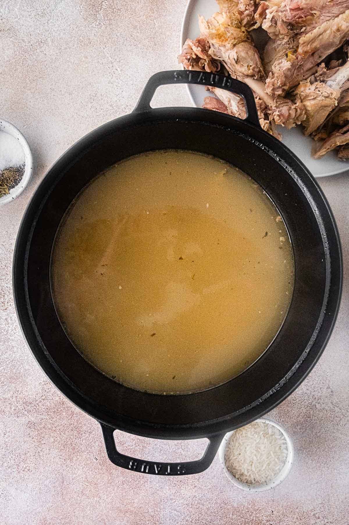 Turkey Carcass Soup strained broth in pot