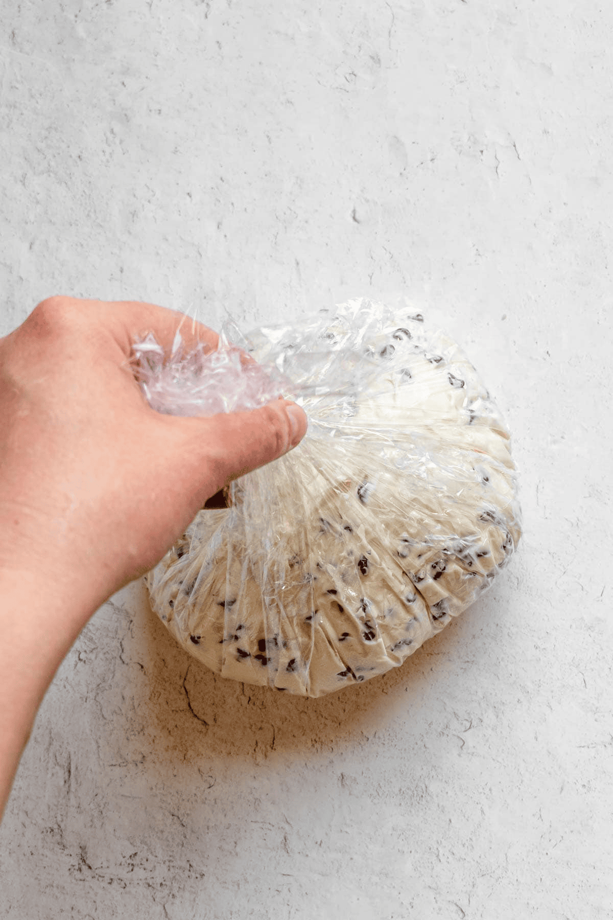 Wrapping cream cheese mixture in plastic wrap