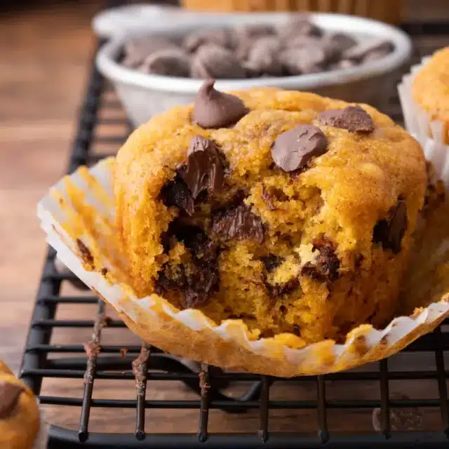 Baked muffin with bite taken out.