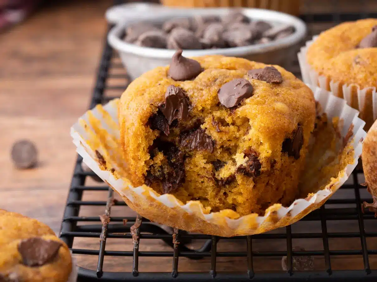 Baked muffin with bite taken out. 