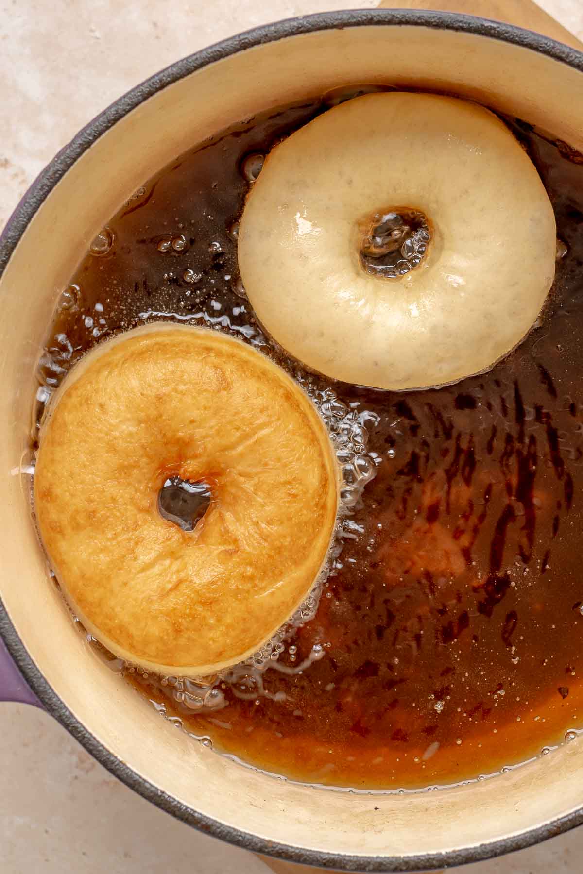 Yeast Donuts frying in oil
