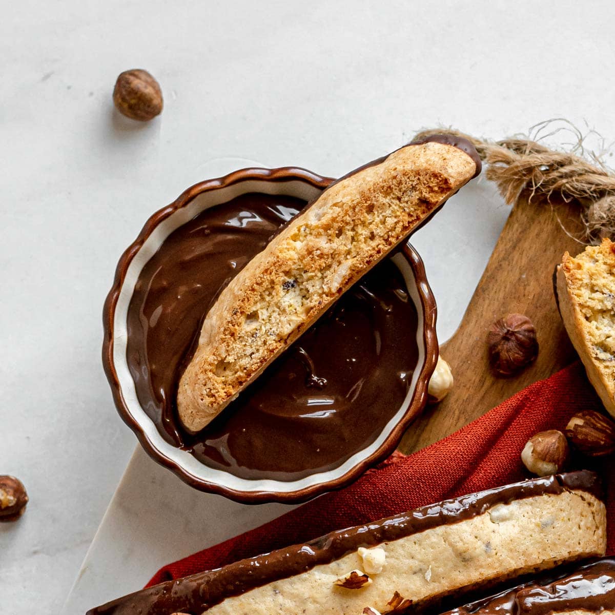 https://dinnerthendessert.com/wp-content/uploads/2023/12/1x1-Chocolate-Hazelnut-Biscotti-Hero-1.jpg