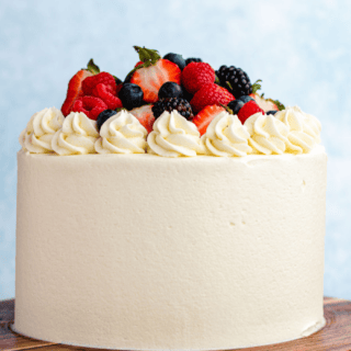 finished cake with berries on top