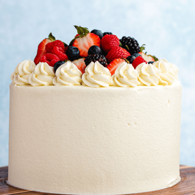 finished cake with berries on top