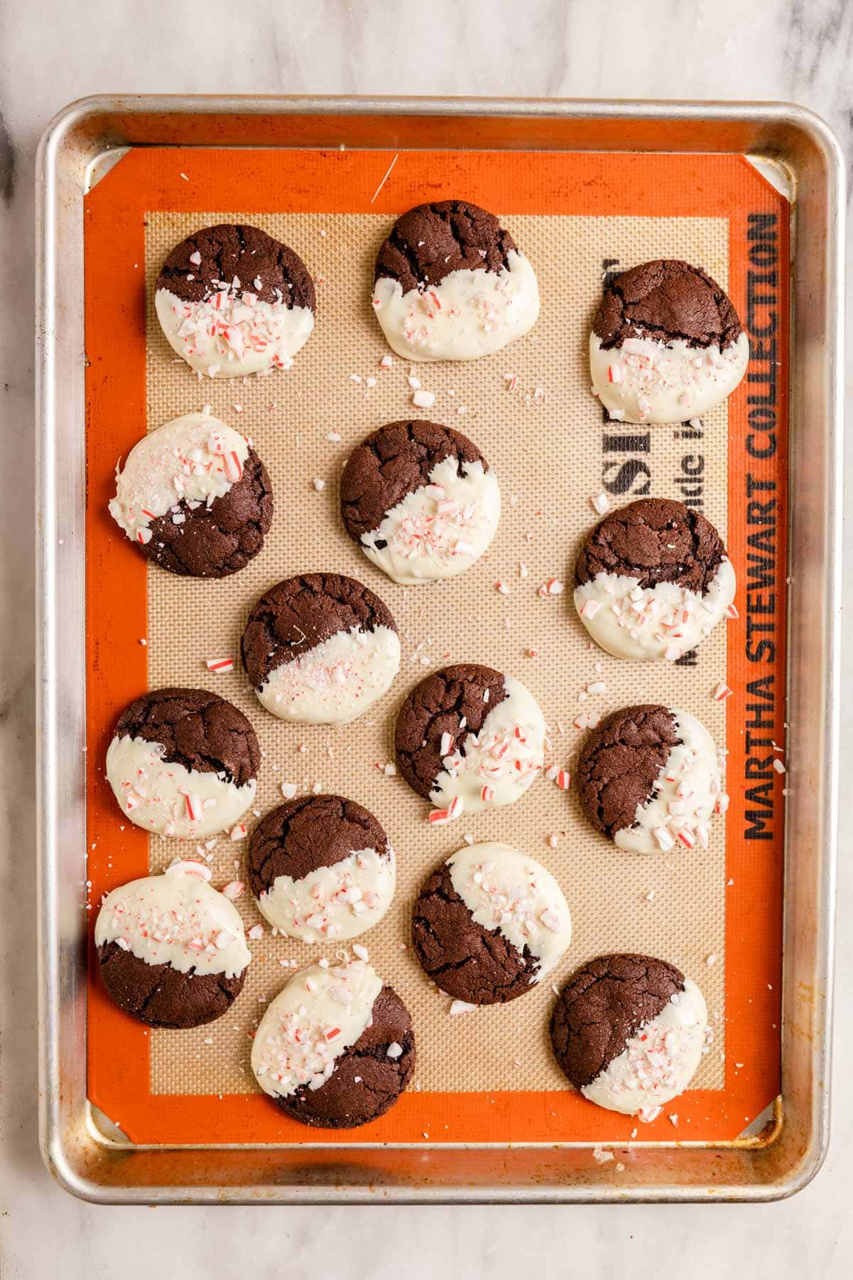 Peppermint Bark Cookies baked and dipped on baking tray