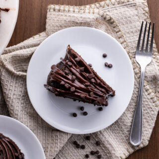 slice of chocolate cake on white plate