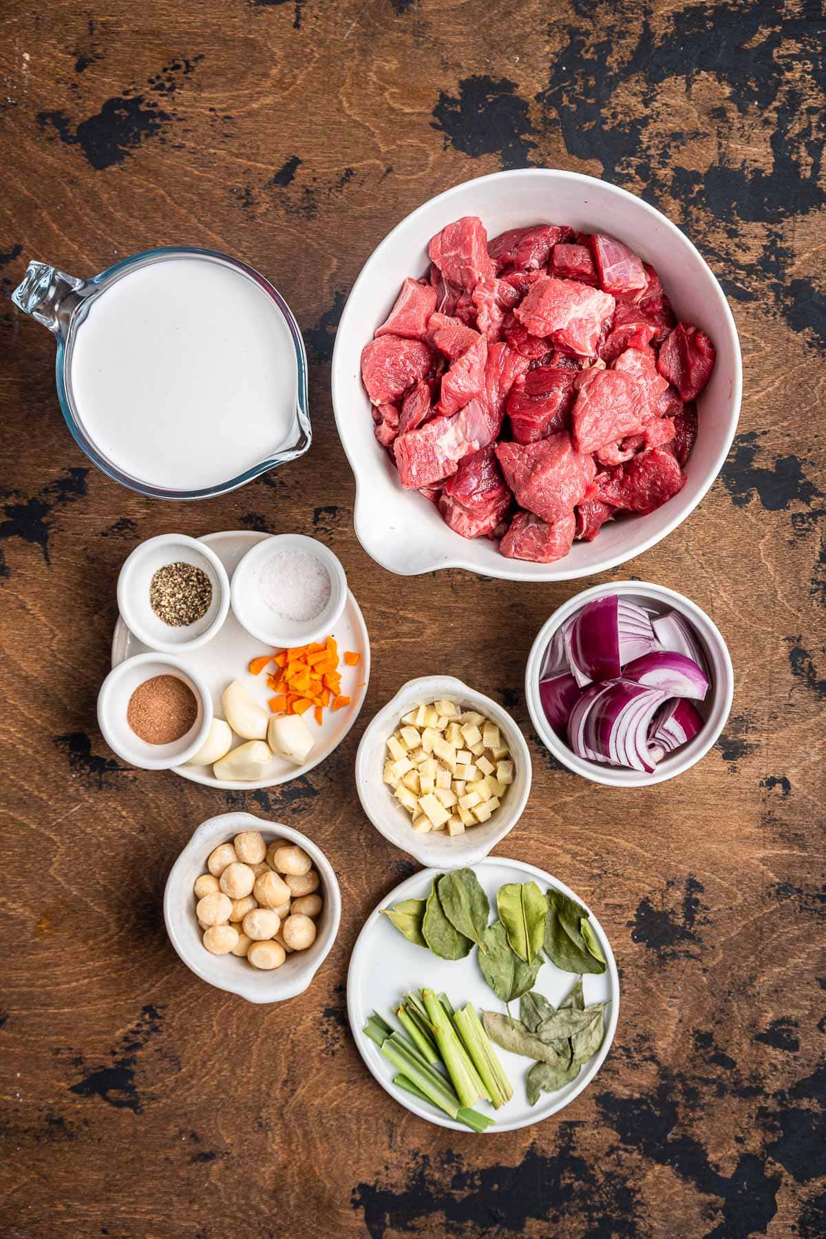 Beef Rendang ingredients laid out separately in prep bowls
