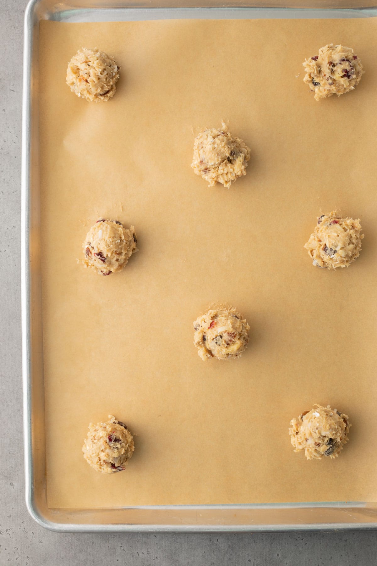 Breakfast Cookies dough balls on parchment lined baking sheet