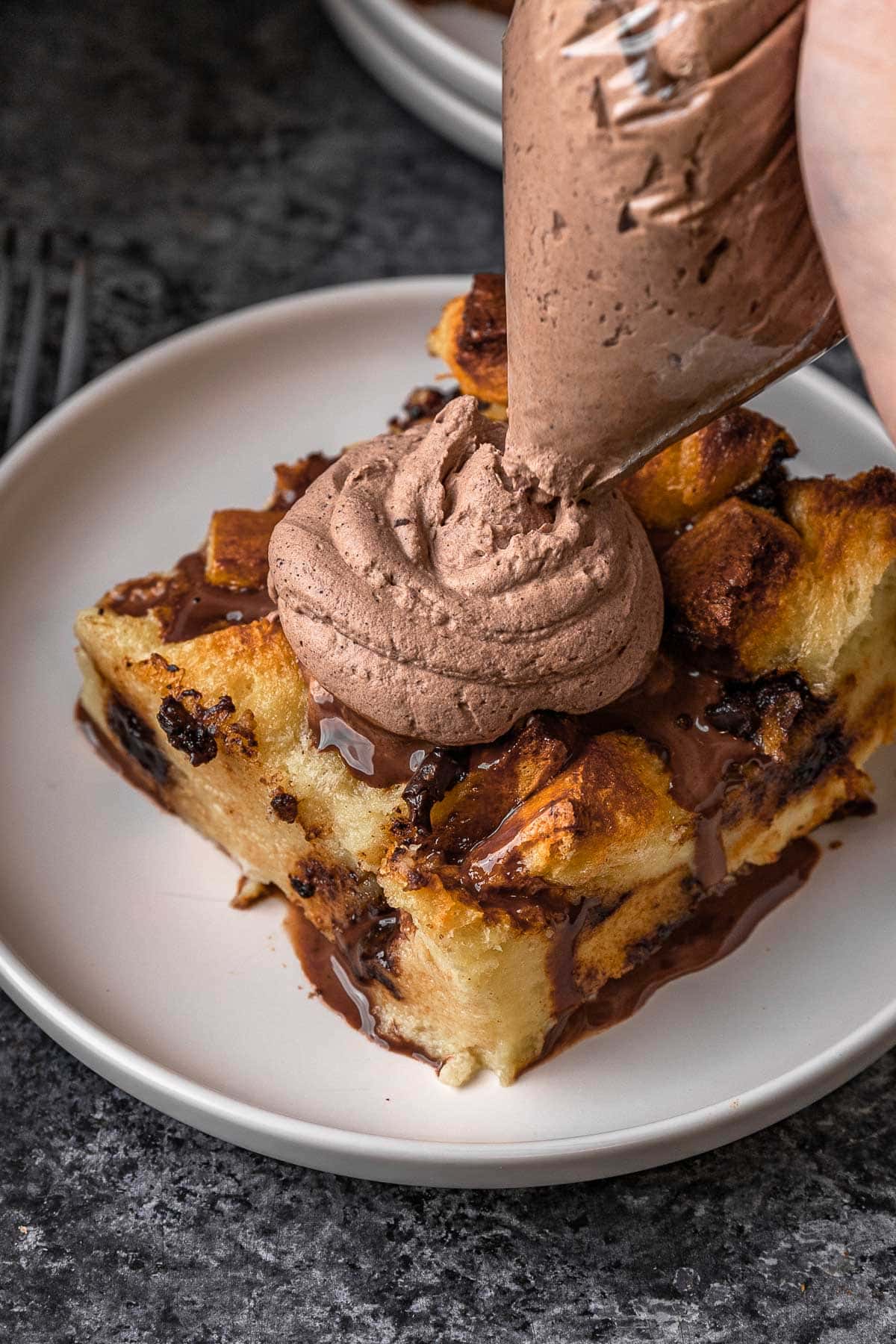 Chocolate Whipped Cream on bread pudding