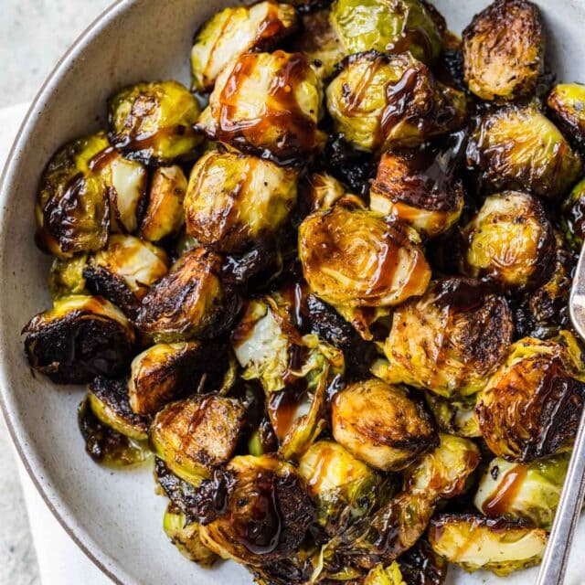 Finished Roasted Balsamic Brussels Sprouts drizzled with glaze