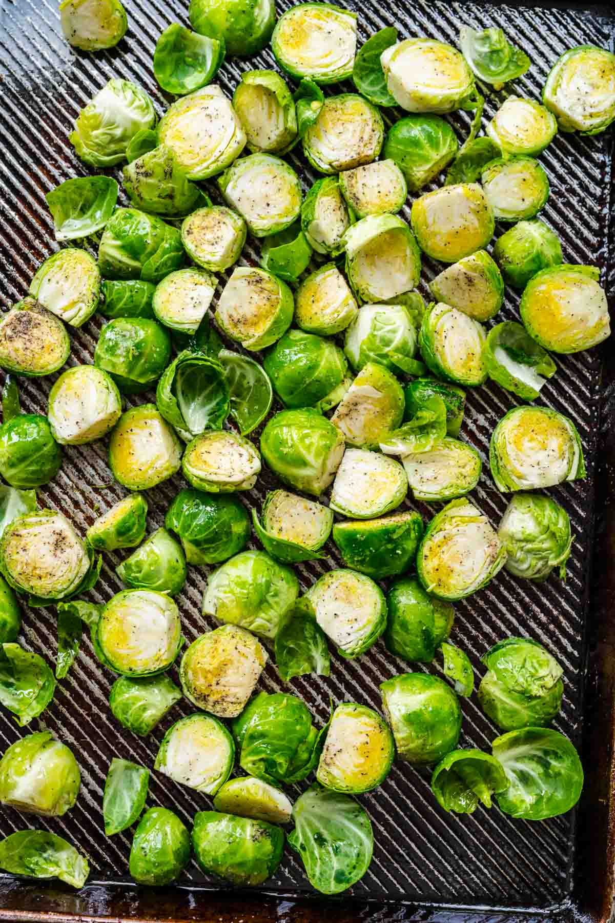 Raw, Roasted Balsamic Brussels Sprouts on a baking sheet