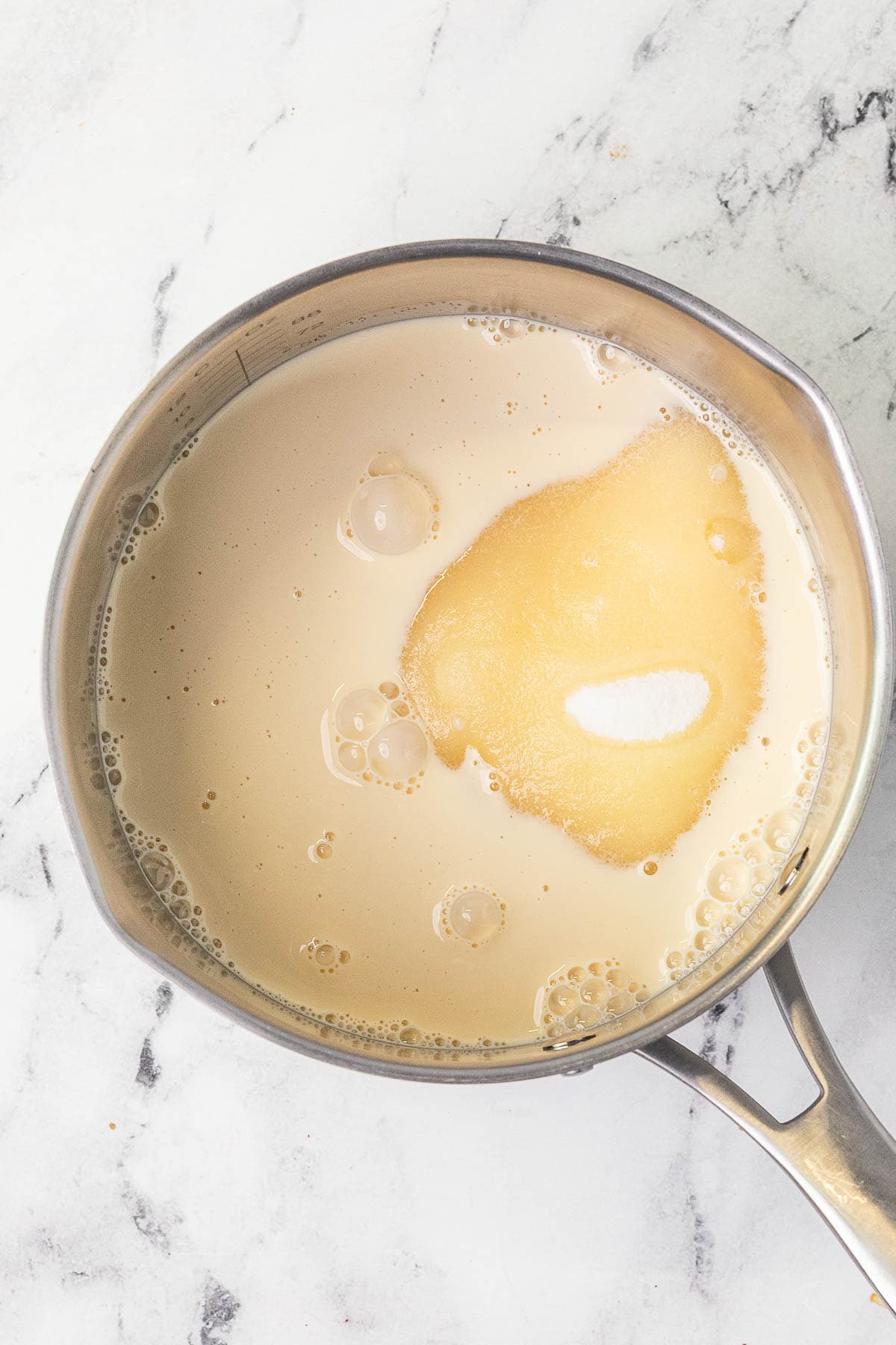Ingredients melting in pot