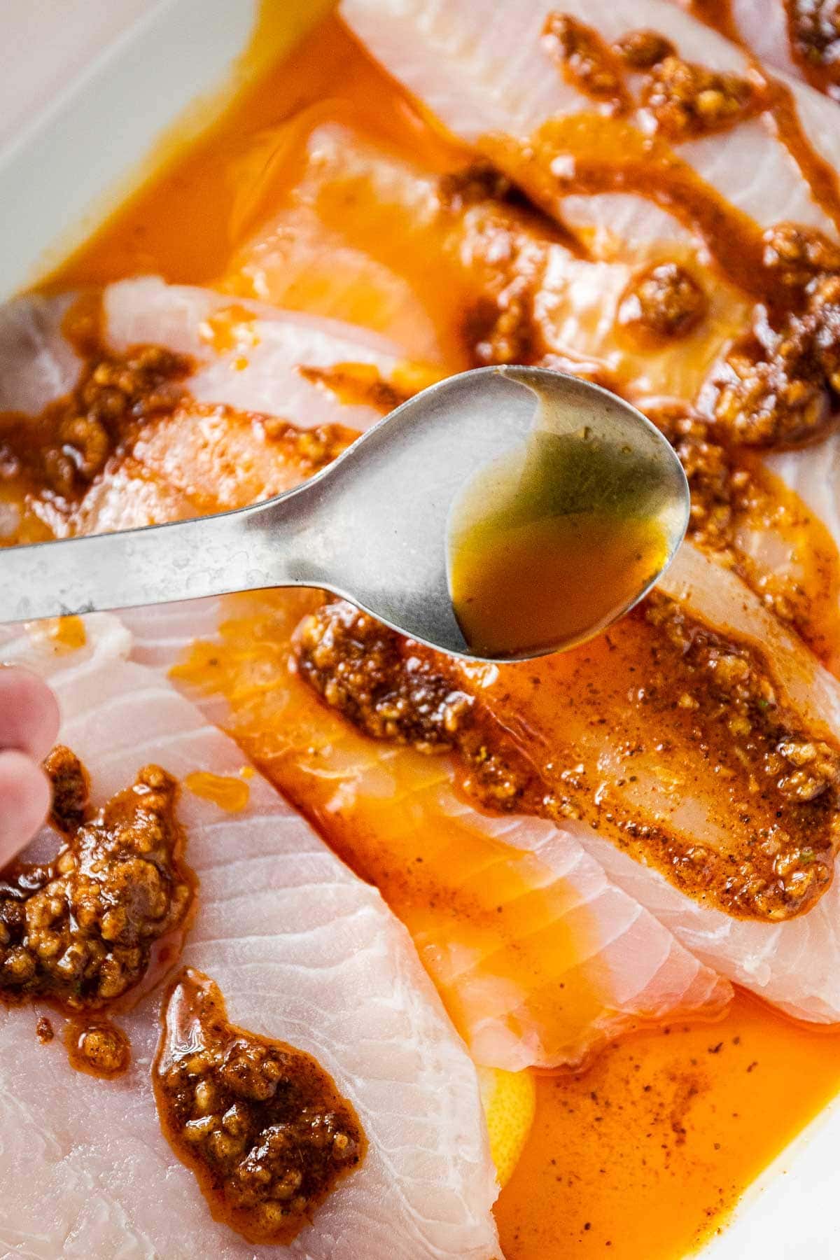 sponing over marinade 