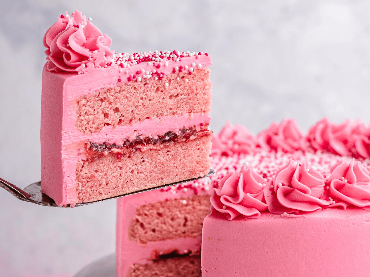 Baked dessert with a slice cut out of it showing the inside