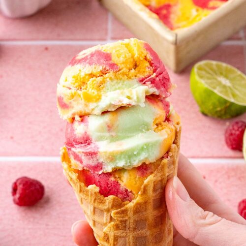 two scoops of sherbet on an ice cream cone