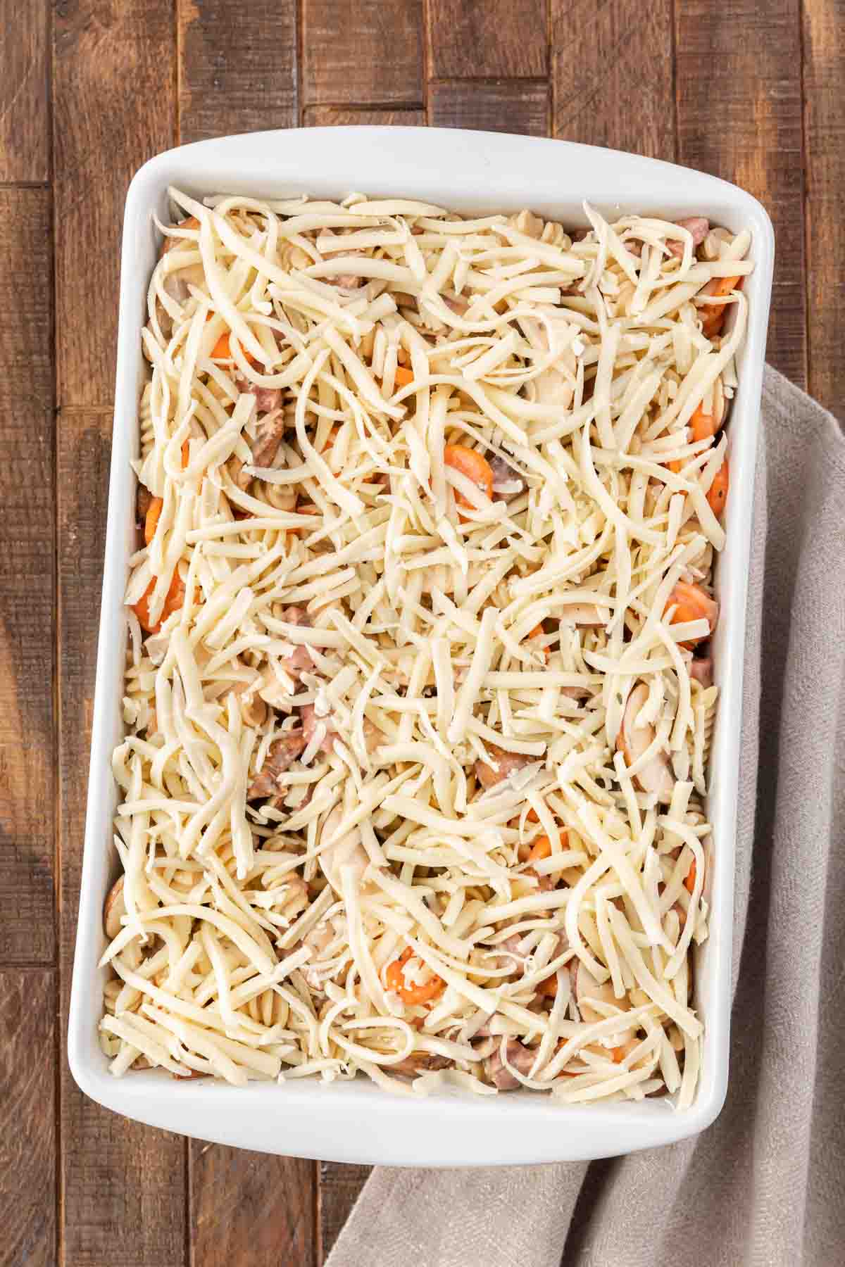 topping with shredded Mozzarella cheese