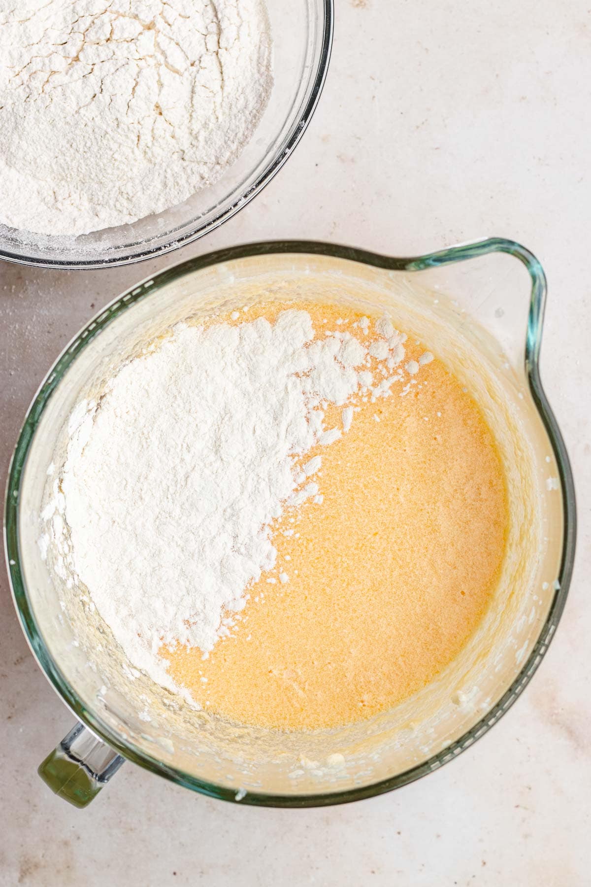 Sour Cream Pound Cake batter with dry ingredients being mixed in