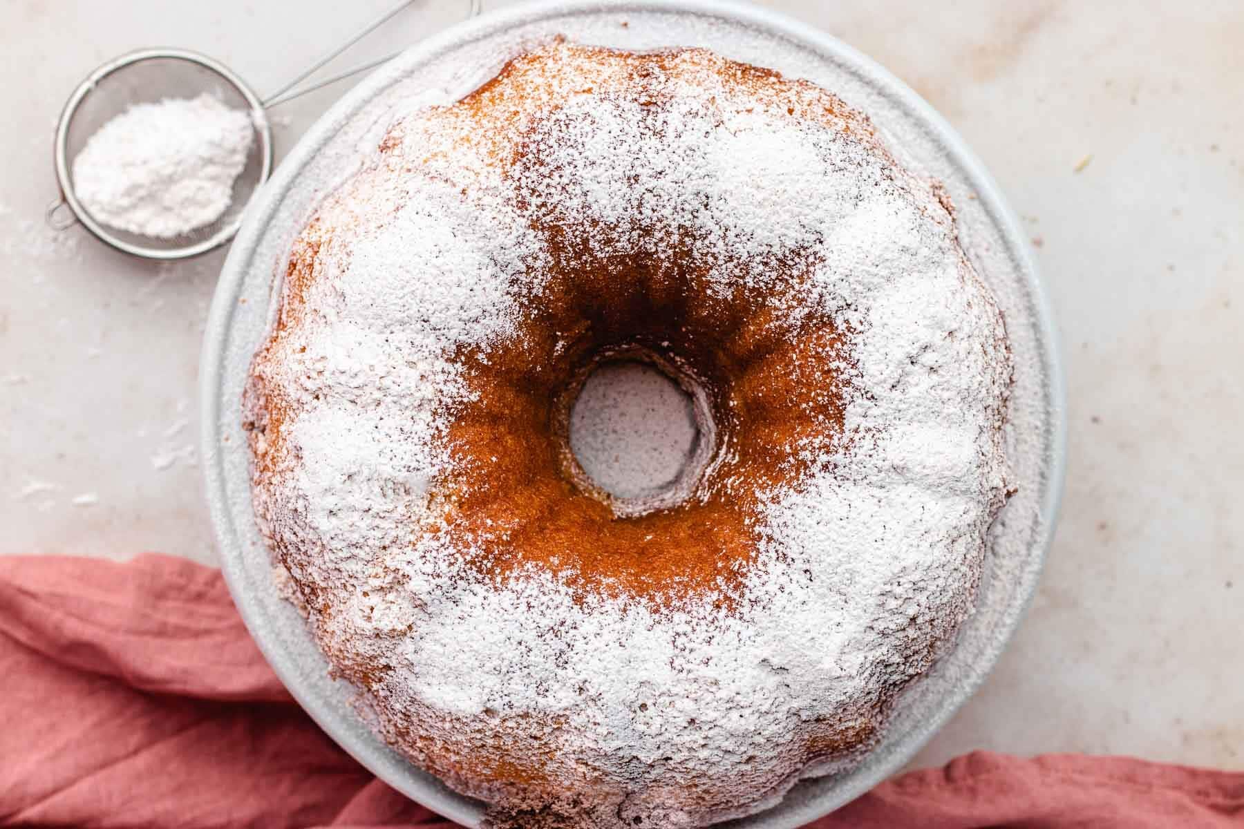 Aerial view of Sour Cream Pound Cake with powdered sugar